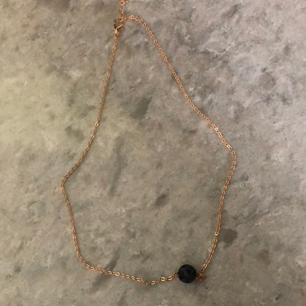 Elegant Gold Chain Necklace with Black Bead